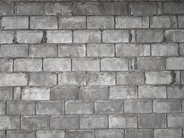 schwarz und Weiß abstrakt Backstein Muster, Design, alt, Backstein Mauer foto