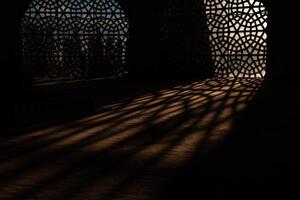 islamisch oder Ramadan Konzept Hintergrund Foto. islamisch Muster Schatten foto
