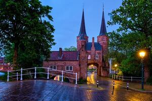 Oostport östlichen Tor von delft beim Nacht. delft, Niederlande foto