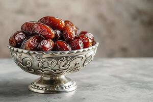 ai generiert roh Datum Obst bereit zu Essen im Silber Schüssel auf Beton Hintergrund. traditionell, köstlich und gesund Ramadan Essen foto