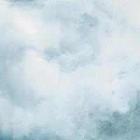 Winter Blau Tinte und Aquarell Texturen auf Weiß Papier, abstrakt Hand gemalt Hintergrund mit Ombre Auswirkungen foto