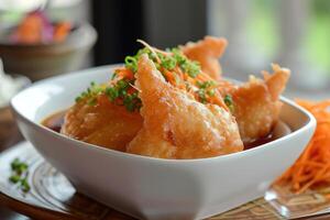 ai generiert tief gebraten knusprig Nuggets serviert im ein Weiß Schüssel foto