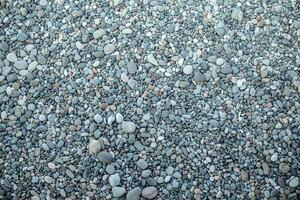 abstrakt Hintergrund mit trocken runden peeble Steine. Meer Stein schließen oben foto