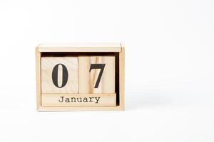 hölzern Kalender Januar 07 auf ein Weiß Hintergrund foto