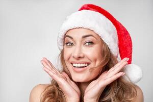 Frau Weihnachten Santa Hut Weiß Studio Hintergrund foto