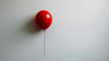 ai generiert rot Ballon befestigt zu Weiß Mauer foto