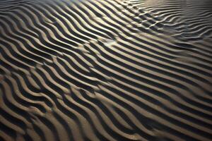 ai generiert faszinierend Muster erstellt durch Licht und Schatten auf ein Strand. generativ ai foto