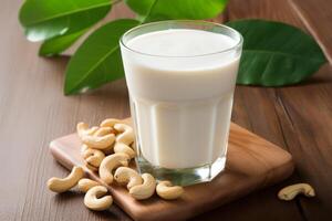 ai generiert Cashew Milch im ein Glas mit Cashew Nüsse wie Garnierung. generativ ai foto