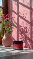 ai generiert Rosa Mauer mit Vase von Blumen foto