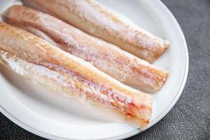 Seehecht Fisch Filet frisch Meeresfrüchte lecker gesund Essen Kochen Vorspeise Mahlzeit Essen Snack auf das Tabelle foto