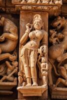 berühmt Skulpturen von khajuraho Tempel, Indien foto