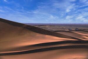 ein Sand Düne von Sahara Wüste beim mhamid el Abonnieren im Marokko Tele Schuss foto