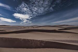 ein Sand Düne von Sahara Wüste beim mhamid el Abonnieren im Marokko foto