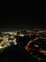 Antenne Nacht Aussicht von beleuchtet Stadt Center Gebäude von Birmingham zentral Stadt von England vereinigt Königreich. März 30., 2024 foto