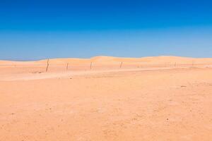 Sand Dünen von Sahara Wüste in der Nähe von ong jemel im Tozeur, Tunesien. foto