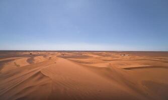 ein Panorama- Sand Düne von Sahara Wüste beim mhamid el Abonnieren im Marokko breit Schuss foto