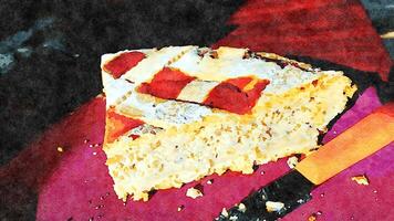 ein groß Scheibe von traditionell Italienisch Dessert im ein Teller mit das Messer benutzt zum Schneiden neben foto