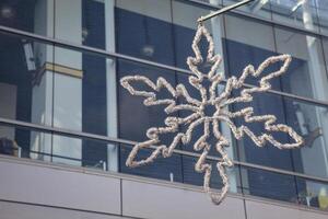 Schnee Flocke mit Beleuchtung Urlaub Dekoration foto