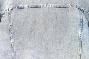 modisch Denim Jeans zum Jugendliche Textur Hintergrund foto