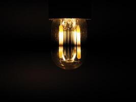 billig LED Glühfaden Licht Birne flackern foto