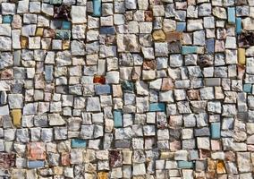 Mosaiktextur der kleinen Steinmauer foto