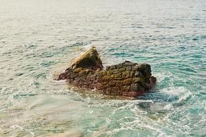 Felsen und Steine auf das Ufer von gran Canaria foto