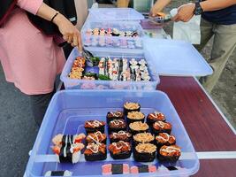 Straße Essen angeboten beim ein Auto kostenlos Tag Veranstaltung im Surakarta, Indonesien foto