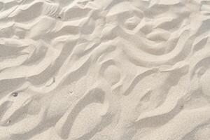 Sand von Gelassenheit Umarmen das Schönheit von natürlich Motiv Sand, ein still Tapisserie von Erde Muster foto