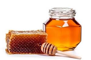 Honig mit Bienenwabe isoliert auf Weiß Hintergrund.. foto