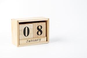 hölzern Kalender Januar 08 auf ein Weiß Hintergrund foto