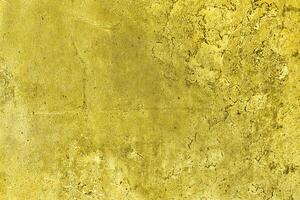 Textur von golden dekorativ Gips oder Beton. abstrakt Gold Grunge Hintergrund. foto