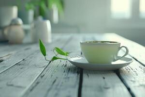 Tasse mit Grün Tee auf grau hölzern Hintergrund foto