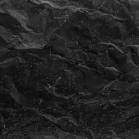 abstrakt Hintergrund, texturiert Oberfläche von zerknittert schwarz Papier. foto