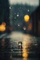 Regentropfen auf das Straße beim Nacht foto