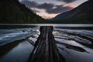ai generiert ein Log sitzt auf das Ufer von ein See beim Sonnenuntergang foto