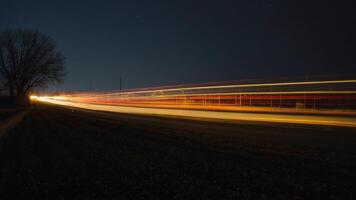 ai generiert ein lange Exposition fotografieren von ein Autobahn beim Nacht foto