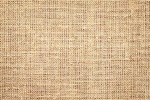 Beige Leinen- Textur Hintergrund. natürlich Baumwolle Sackleinen foto