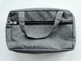 Beutel oder Tasche Stoff mit grau Farbe auf Weiß Hintergrund foto