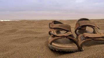 Hintergrund Sandalen am Strand foto