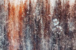das Oberfläche von das Zement Mauer mit Farbe Flecken von verlängert Waschen durch Wasser foto