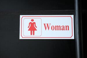 Frau Toilette Zeichen und Symbole foto