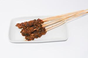 stillen Muscheln oder stillen Muscheln ist ein traditionell indonesisch Essen gemacht von Schaltier und bedeckt im Soße. angkringan Muschel satay. foto