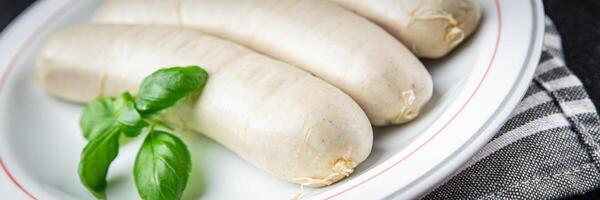 Weiß Würstchen Fleisch Weißwurst bayerisch Würste zweite Kurs frisch Kochen Vorspeise Mahlzeit Essen Snack auf das Tabelle Kopieren Raum Essen Hintergrund foto