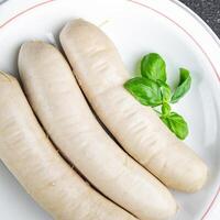 Fleisch Weiß Würstchen Weißwurst bayerisch Würste Kochen Vorspeise Mahlzeit Essen Snack auf das Tabelle foto