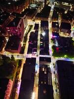 Antenne Nacht Aussicht von beleuchtet zentral Manchester Stadt und Innenstadt Gebäude, England vereinigt Königreich. kann 4., 2024 foto