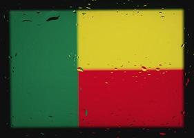 Wassertropfen auf dem Hintergrund der Benin-Flagge. geringe Schärfentiefe. selektiver Fokus. getönt. foto