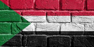 Flagge von Sudan auf das Mauer foto