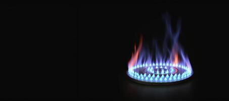 Blau Flamme von ein Gas Brenner auf ein schwarz Hintergrund Banner foto