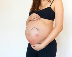 Bauch mit Smiley Gesicht. foto