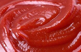 Nahansicht von Ketchup oder Tomate Soße Textur foto